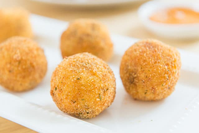 Two Potato Balls Are Partially Eaten With Cheese In The Middle Background,  Croquette On White Background, Hd Photography Photo Background Image And  Wallpaper for Free Download