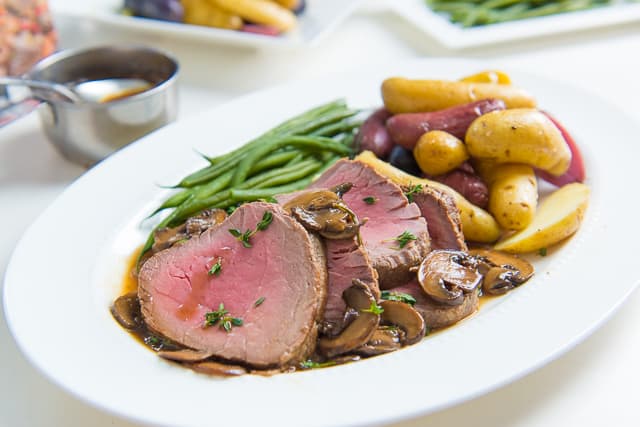 Beef Tenderloin Roasted In The Oven And Served With Mushroom Sauce